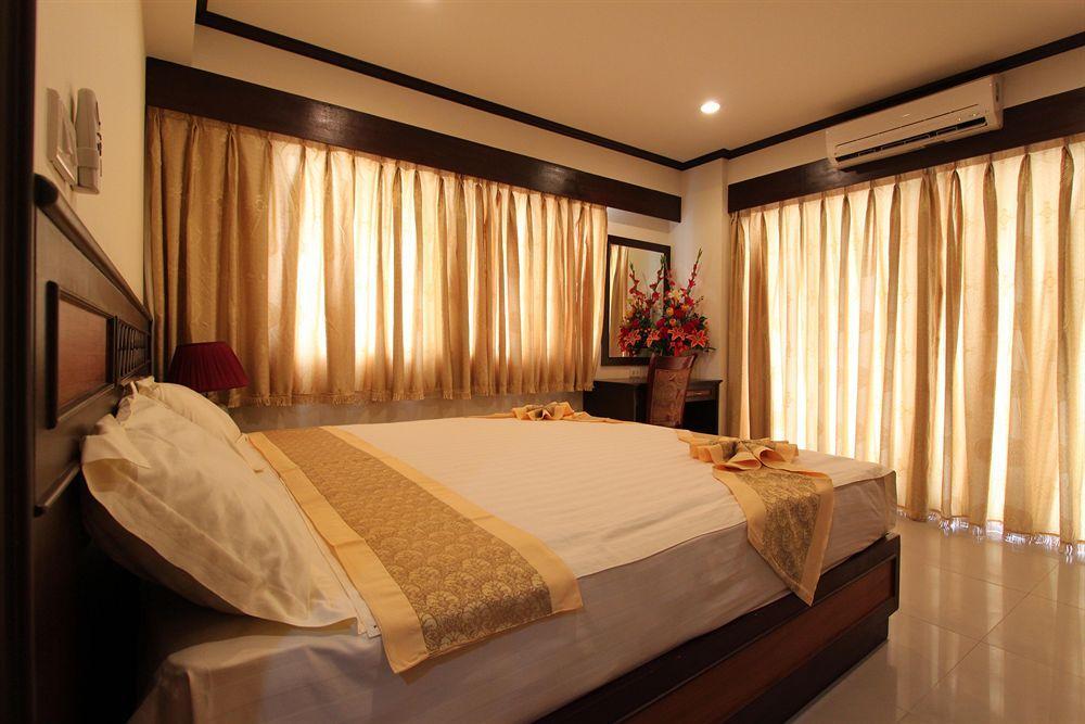 Miloft Sathorn Hotel - Sha Plus Certified Bangkok Luaran gambar A bedroom at the hotel